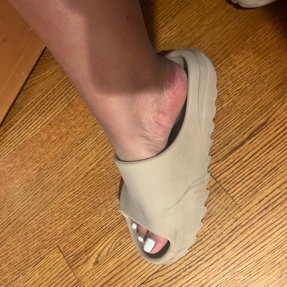 Yeezy slides , look pictures for condition, a couple of scratches